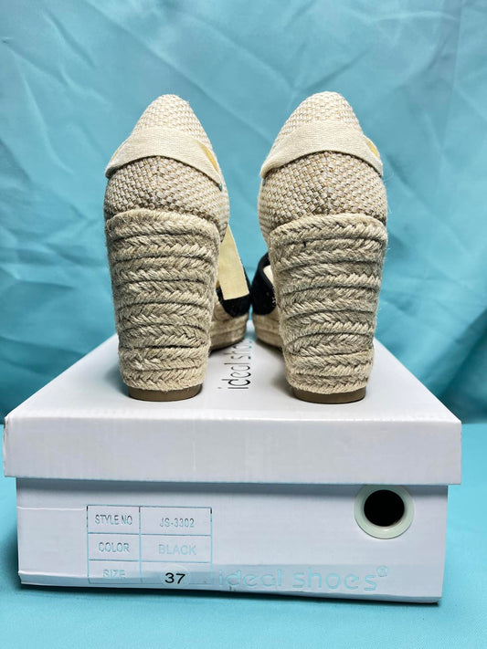 Woman's size 3 Wedges with Black Pattern design 2250