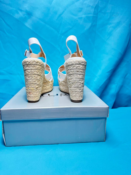 Woman's size 7 white open toe wedges 2184