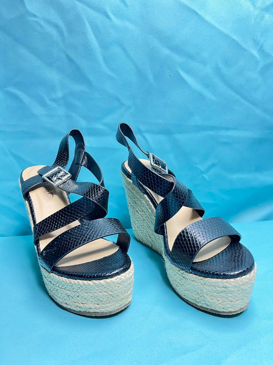 Woman's size 6 Black open toe wedges 1387